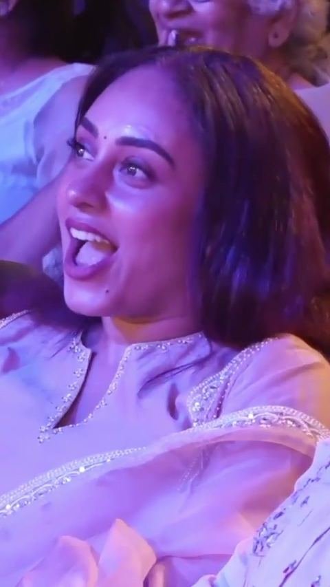 An audience member reacting in shock during the show